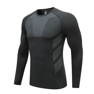 Detailed view of men's long sleeve quick-dry compression fitness shirt with grey patterns