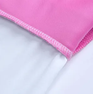 Close-up of quick-drying fabric stitching on pink and white sports skort