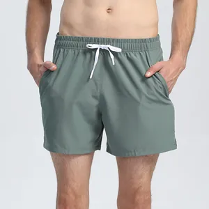 Unisex quick-dry athletic shorts for running and gym training in olive green finish.