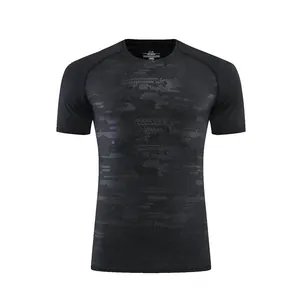 Macro detail of men's compression sports t-shirt featuring a dark camouflage pattern
