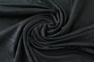 Close-up of black quick-dry breathable fabric for men's athletic sport t-shirts