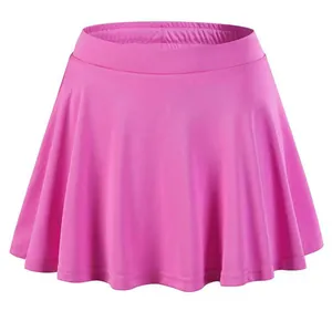 Vibrant pink quick-dry sports skort for girls with built-in anti-exposure lining.