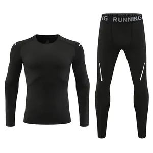 Front view of black compression set showing long sleeve shirt and matching leggings