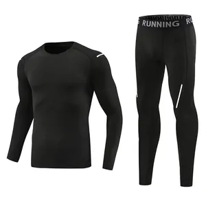 Detail view of men's black quick-dry compression long-sleeve top and leggings set