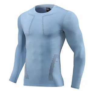 High-performance men's light blue long-sleeve compression shirt for fitness and sports