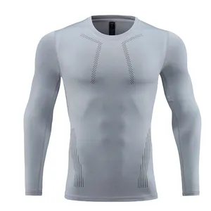 Detailed front view of light grey men's long-sleeve compression fitness shirt for training