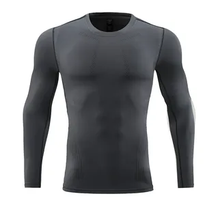 Front view of men's gray long-sleeve compression shirt for gym and running training