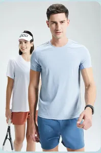 Front view of men's light blue quick-dry athletic T-shirt in outdoor sports setting