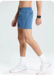 Side view of men's blue quick-dry running shorts with mesh breathable detail