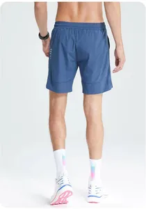 Rear view of professional men's quick-dry blue sports shorts featuring breathable mesh panels