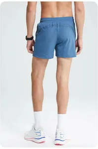 Back view of men's quick-dry blue running shorts for fitness and outdoor sports
