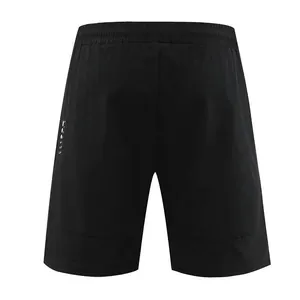 Detailed back view of men's black quick-dry sports shorts for running and gym training.