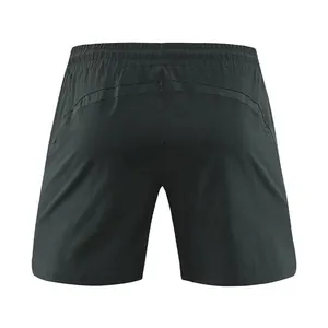 Back view of men's quick-dry sports shorts featuring breathable mesh details and elastic waist