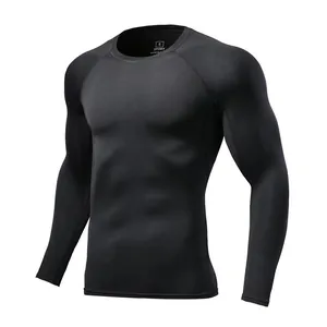 Close-up detail of black quick-dry long sleeve compression shirt with a comfortable round neck.