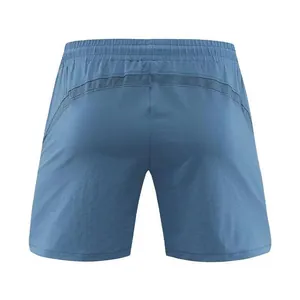 Detailed back view of men's quick-dry blue sports running shorts with mesh paneling
