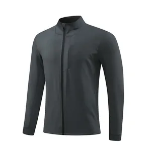 Front view of men's dark grey sports jacket with stand collar and zipper pocket detail