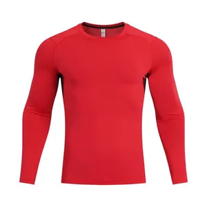 Front view of red long-sleeve compression shirt with crew neck and athletic fit design