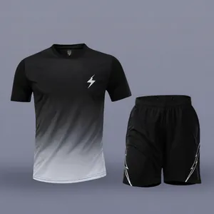 Detail of men's quick-dry sports set with black-white gradient and lightning logo