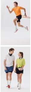 Modelos masculino y femenino muestran camisetas deportivas transpirables de secado rápido.