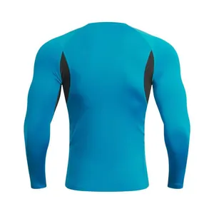 Rear view detail of blue long-sleeve sports compression shirt with grey breathable panels