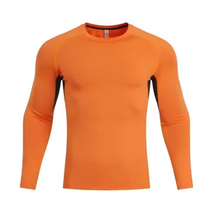 Front view of men's long-sleeve orange compression shirt with black side panels