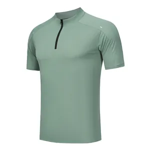 Detailed view of a sage green men's quick-dry sports T-shirt with a half-zipper.