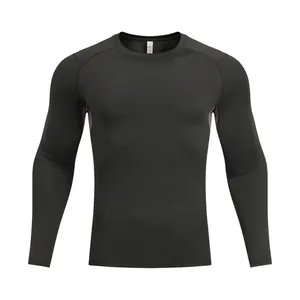 Front view of a black men's long-sleeve compression t-shirt for fitness and running.