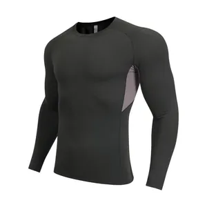 Men's athletic long-sleeve compression shirt in dark grey for gym, running, and fitness