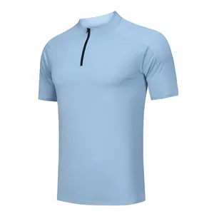 Detail view of a men's light blue quick-dry sports T-shirt with half-zipper collar