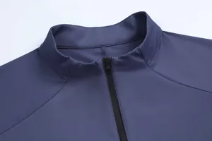 Close-up of the collar and half-zipper on a men's blue quick-dry sports T-shirt
