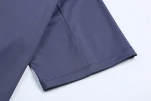 Close-up of honeycomb textured fabric and stitching on men's quick-dry sports T-shirt