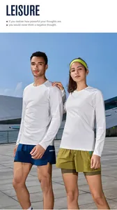 Long-sleeved quick-dry sports T-shirts worn by models in an outdoor fitness setting