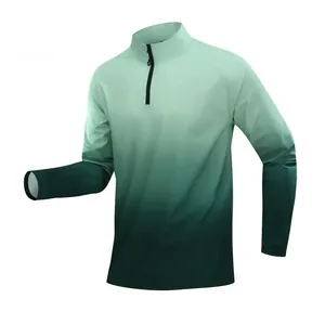 Detailed view of men's green gradient quarter-zip performance athletic long sleeve shirt
