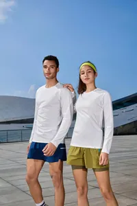 Two models wearing white quick-dry long-sleeved running shirts in an outdoor setting.