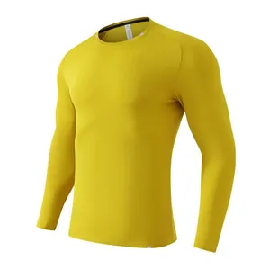Close-up view of mustard yellow men's quick-drying long-sleeved athletic sports shirt