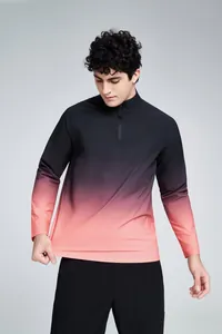 Detail view of men's half-zip quick-dry athletic shirt featuring a black to pink gradient