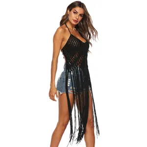 Detailed view of handmade black crochet halter beach cover-up with long fringe