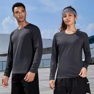 Pair of models wearing grey long-sleeved quick-dry sports T-shirts for outdoor running