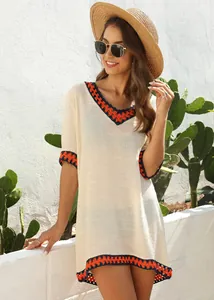 Elegant boho hand-crocheted V-neck beach cover-up with contrast trim in cream white