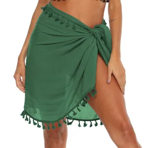 Gonna a portafoglio da spiaggia verde scuro con eleganti nappe e orlo irregolare