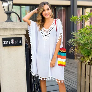 White crochet tassels beach cover-up dress with V-neck and loose fit for summer vacation