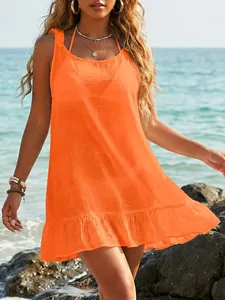 Vibrant orange bikini cover-up dress with ruffles and adjustable bow shoulder straps