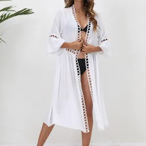 Elegant white loose lace patchwork beach cover-up with 3/4 sleeves for women's vacation