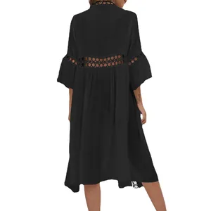 Back view of stylish black beach cover-up with lace hollow-out details for women