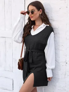 Stylish women's autumn knitted vest dress featuring a waist tie and side slit detail