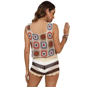 Bohemian crochet knit two-piece set featuring floral tank top and hollow-out shorts