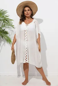 Plus size white crochet patchwork beach cover-up dress with bohemian V-neck design