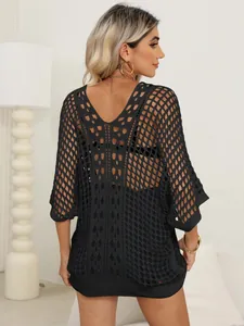 Women's black crochet bikini cover-up with hollow-out pattern and batwing sleeves