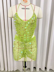 Detailed view of lime green handmade crochet beach cover-up set with iridescent sequins