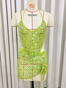 Detail of lime green handmade crochet bikini cover-up set with iridescent sequins